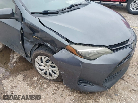 2018 Toyota Corolla L z VIN 5YFBURHE8JP762341, wystawiony jako IAAI lot #41616281 z przebiegiem 141 882 mil mil oraz . Historia ofert i sprzedaży dostępna na DreamBid. Obrazek 6.