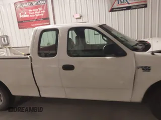 2001 Ford F-150 XL with VIN 1FTPX17L31NB27121, listed as a IAAI auction lot 41169060 with 247,389 mi miles and . Bid and sale history available at DreamBid. Image 13.