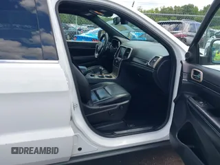 2014 Jeep Grand Cherokee Limited with VIN 1C4RJFBG3EC350648, listed as a IAAI auction lot 42523221 with 125,447 mi miles and . Bid and sale history available at DreamBid. Image 5.