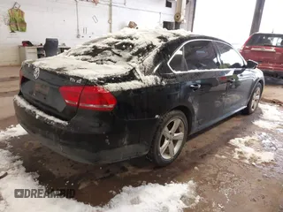 2013 Volkswagen Passat TDI SE with VIN 1VWBN7A39DC003511, listed as a IAAI auction lot 41469644 with 167,962 mi miles. Bid and sale history available at carsss.com. Image 4.