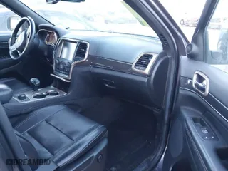 2014 Jeep Grand Cherokee Overland with VIN 1C4RJFCT8EC380899, listed as a IAAI auction lot 41372034 with 140,413 mi miles. Bid and sale history available at carsss.com. Image 5.