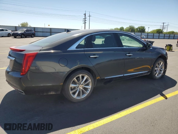 2013 Cadillac XTS Luxury with VIN 2G61R5S32D9216672, listed as a Copart auction lot 58392955 with 94,272 mi miles and Salvage title. Bid and sale history available at DreamBid. Image 3.