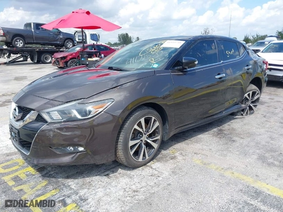 2016 Nissan Maxima 3.5 SR with VIN 1N4AA6AP9GC405420, listed as a IAAI auction lot 41933739 with 59,680 mi miles. Bid and sale history available at carsss.com. Image 2.