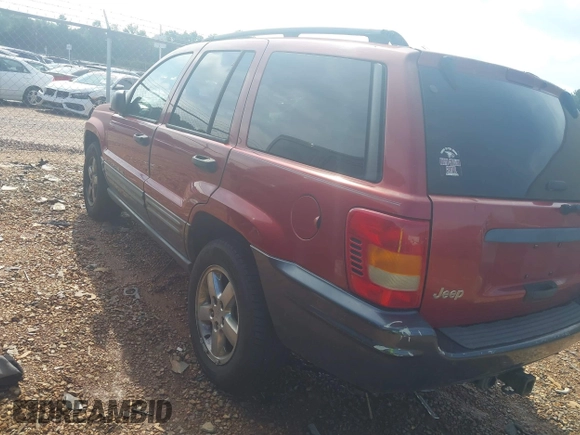 2004 Jeep Grand Cherokee Laredo with VIN 1J4GW48S34C419596, listed as a IAAI auction lot 42515494 with 276,196 mi miles and . Bid and sale history available at DreamBid. Image 3.
