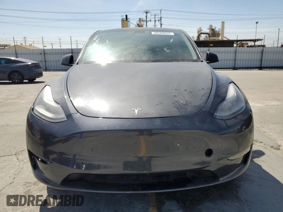 2024 Tesla Model Y Long Range with VIN 7SAYGDEEXRA237667, listed as a Copart auction lot 58260635 with Not provided miles and Salvage title. Bid and sale history available at DreamBid. Image 5.