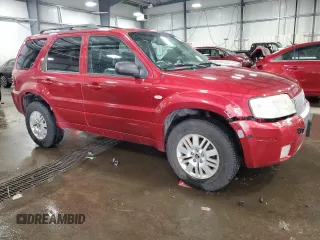 2007 Mercury Mariner Luxury with VIN 4M2YU91127KJ08616, listed as a Copart auction lot 42007945 with 196,691 mi miles and Salvage title. Bid and sale history available at DreamBid. Image 4.