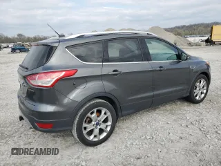 2016 Ford Escape Titanium with VIN 1FMCU0JX6GUB12975, listed as a Copart auction lot 53126705 with 100,815 mi miles and Clean Title. Bid and sale history available at carsss.com. Image 3.