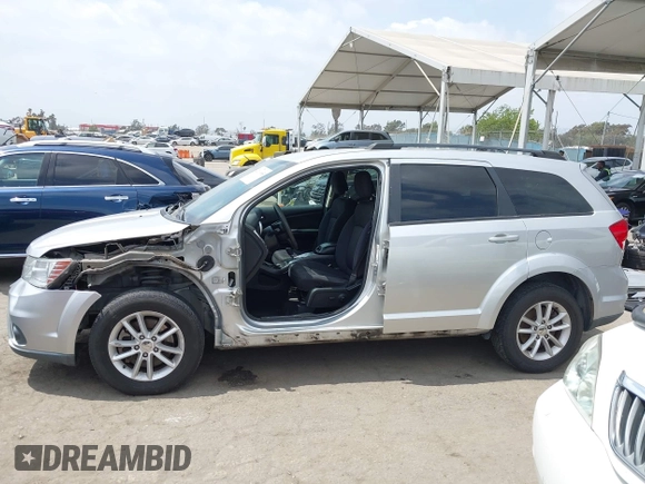2013 Dodge Journey SXT with VIN 3C4PDCBG9DT506384, listed as a IAAI auction lot 42119685 with 143,769 mi miles. Bid and sale history available at carsss.com. Image 15.