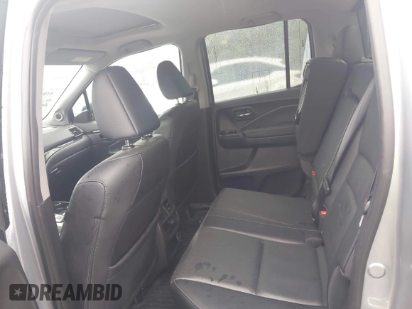 2020 Honda Ridgeline RTL-E with VIN 5FPYK3F73LB004365, listed as a IAAI auction lot 41965887 with 80,981 mi miles and . Bid and sale history available at DreamBid. Image 8.