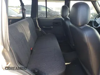2001 Jeep Cherokee Sport z VIN 1J4FF58S61L540796, wystawiony jako Copart lot #62384895 z przebiegiem 209 294 mil mil oraz Czysty tytuł • Clean title. Historia ofert i sprzedaży dostępna na DreamBid. Obrazek 10.