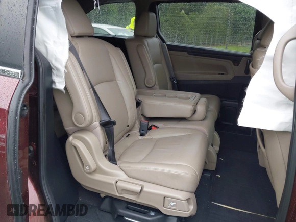2021 Honda Odyssey Touring with VIN 5FNRL6H88MB006938, listed as a IAAI auction lot 42367022 with 63,280 mi miles and . Bid and sale history available at DreamBid. Image 8.
