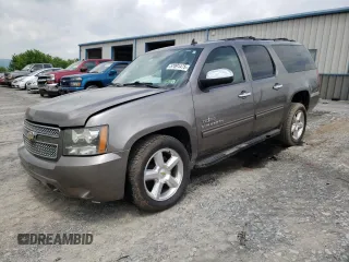 2011 Chevrolet Suburban LS z VIN 1GNSCHE02BR181423, wystawiony jako Copart lot #57091475 z przebiegiem 98 720 mil mil oraz Czysty tytuł • Clean title. Historia ofert i sprzedaży dostępna na DreamBid. Obrazek 1.