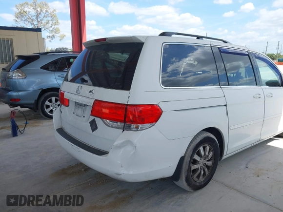 2009 Honda Odyssey EX-L with VIN 5FNRL386X9B056552, listed as a IAAI auction lot 42126144 with 194,722 mi miles. Bid and sale history available at carsss.com. Image 6.