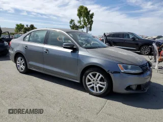 2012 Volkswagen Jetta SE with VIN 3VWDP7AJ7CM427445, listed as a Copart auction lot 63610155 with 161,939 mi miles and Salvage title. Bid and sale history available at DreamBid. Image 4.