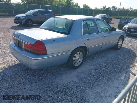 2005 Mercury Grand Marquis LS Premium z VIN 2MEFM75W15X621971, wystawiony jako IAAI lot #42130811 z przebiegiem 129 700 mil mil oraz . Historia ofert i sprzedaży dostępna na DreamBid. Obrazek 4.