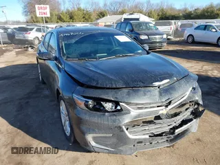 2018 Chevrolet Malibu LT z VIN 1G1ZD5ST6JF128332, wystawiony jako IAAI lot #41467006 z przebiegiem 93 926 mil mil oraz . Historia ofert i sprzedaży dostępna na DreamBid. Obrazek 1.