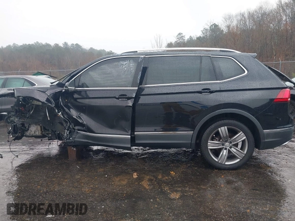 2021 Volkswagen Tiguan SE with VIN 3VV3B7AX3MM058751, listed as a IAAI auction lot 41527365 with 19,646 mi miles and . Bid and sale history available at DreamBid. Image 14.