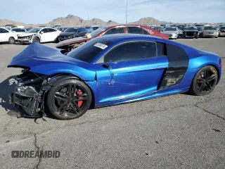 2015 Audi R8 z VIN WUAAUAFG3F7002069, wystawiony jako Copart lot #85268574 z przebiegiem 58 023 mil mil oraz Szkody całkowita. Historia ofert i sprzedaży dostępna na DreamBid. Obrazek 1.