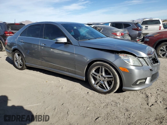2011 Mercedes-Benz E 550 Luxury with VIN WDDHF7CB8BA305630, listed as a Copart auction lot 41521955 with 141,587 mi miles and Salvage Title. Bid and sale history available at DreamBid. Image 4.