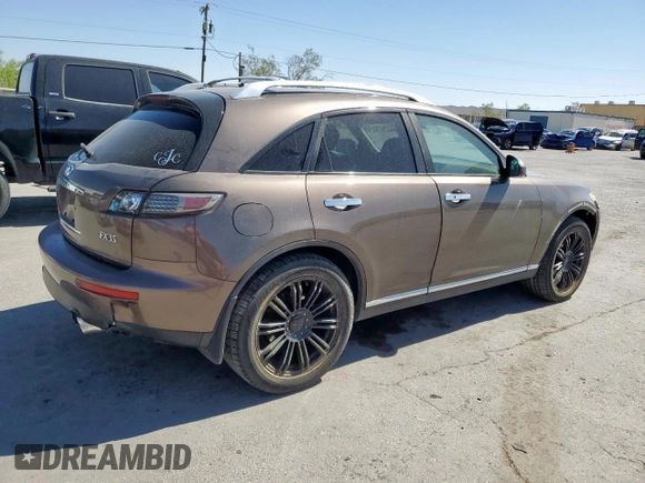 2008 Infiniti FX z VIN JNRAS08W38X203278, wystawiony jako Copart lot #57710405 z przebiegiem 168 007 mil mil oraz Szkoda całkowita • Salvage title. Historia ofert i sprzedaży dostępna na DreamBid. Obrazek 3.