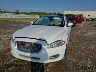 2014 Jaguar XJ Portfolio with VIN SAJWA2GZ3E8V60788, listed as a Copart auction lot 43272405 with 97,196 mi miles and Salvage title. Bid and sale history available at DreamBid. Image 10.