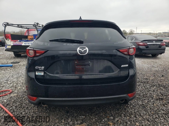 2018 Mazda CX-5 Grand Touring z VIN JM3KFBDM0J0403095, wystawiony jako Copart lot #48594495 z przebiegiem Nie podano mil oraz Szkoda całkowita • Salvage title. Historia ofert i sprzedaży dostępna na DreamBid. Obrazek 6.