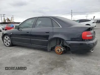 2000 Audi S4 z VIN WAUDD68D5YA126521, wystawiony jako Copart lot #53467815 z przebiegiem 138 629 mil mil oraz Szkoda całkowita • Salvage title. Historia ofert i sprzedaży dostępna na DreamBid. Obrazek 2.
