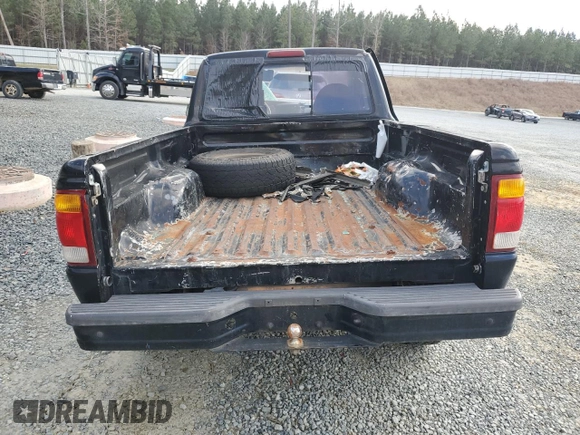 1999 Ford Ranger XL with VIN 1FTYR10C0XTA88744, listed as a Copart auction lot 44258415 with 202,709 mi miles and Salvage title. Bid and sale history available at DreamBid. Image 6.