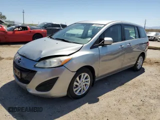2012 Mazda 5 Sport with VIN JM1CW2BL3C0105912, listed as a Copart auction lot 50938335 with 117,479 mi miles and Salvage Title. Bid and sale history available at DreamBid. Image 1.