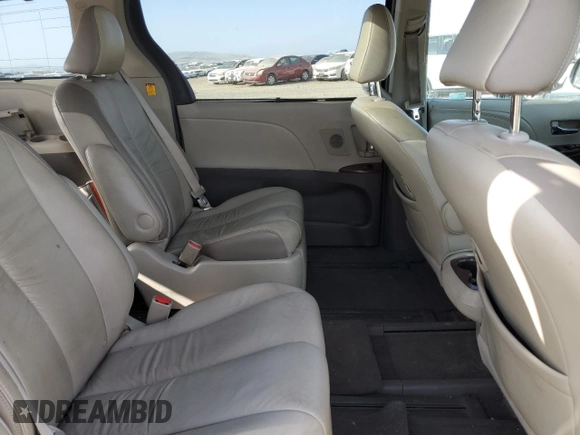 2011 Toyota Sienna XLE AAS with VIN 5TDYK3DC9BS012084, listed as a Copart auction lot 53740365 with 141,440 mi miles and Salvage Title. Bid and sale history available at DreamBid. Image 11.