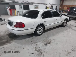 2001 Lincoln Continental with VIN 1LNHM97V81Y667328, listed as a IAAI auction lot 41730916 with 126,179 mi miles and . Bid and sale history available at DreamBid. Image 4.