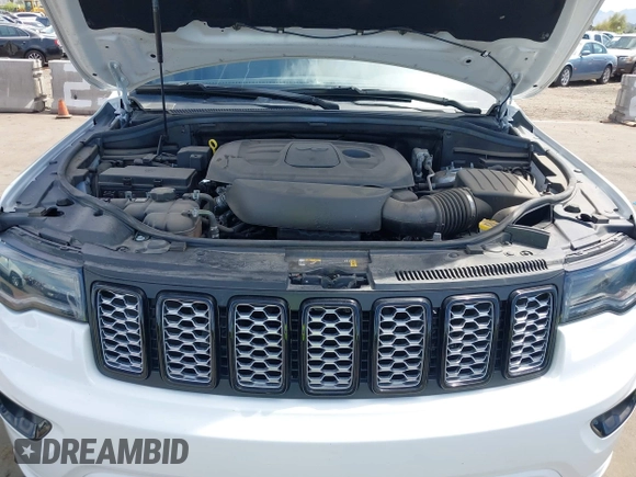 2021 Jeep Grand Cherokee Laredo E with VIN 1C4RJEAG2MC785168, listed as a IAAI auction lot 42115460 with 64,036 mi miles and . Bid and sale history available at DreamBid. Image 10.