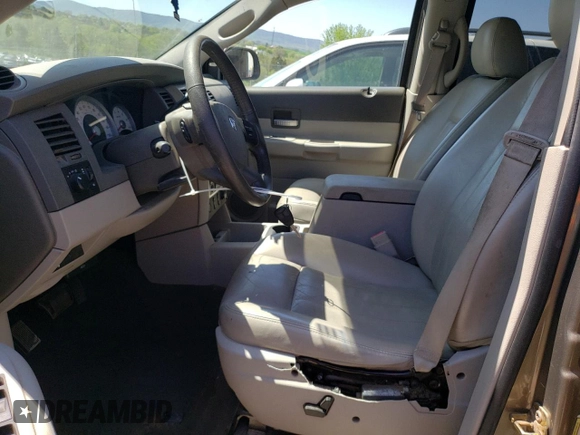 2005 Dodge Durango Limited with VIN 1D8HB58D65F615577, listed as a Copart auction lot 54408425 with 143,011 mi miles and Salvage Title. Bid and sale history available at DreamBid. Image 7.