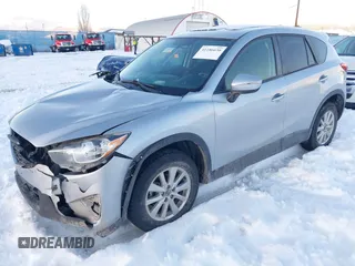 2016 Mazda CX-5 Touring with VIN JM3KE4CY9G0904000, listed as a IAAI auction lot 41186630 with 73,900 mi miles. Bid and sale history available at carsss.com. Image 17.