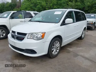 2015 Dodge Grand Caravan SXT with VIN 2C4RDGCG2FR548433, listed as a IAAI auction lot 42121256 with 161,459 mi miles and . Bid and sale history available at DreamBid. Image 2.