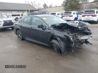 2018 Toyota Camry LE z VIN 4T1B11HK0JU152125, wystawiony jako IAAI lot #41723018 z przebiegiem 321 398 mil mil oraz . Historia ofert i sprzedaży dostępna na DreamBid. Obrazek 1.