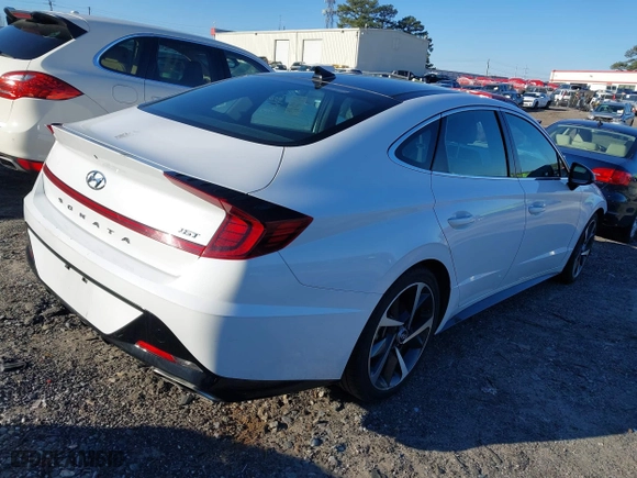 2023 Hyundai Sonata SEL Plus with VIN KMHL44J27PA275714, listed as a IAAI auction lot 41590344 with 64,951 mi miles. Bid and sale history available at carsss.com. Image 4.