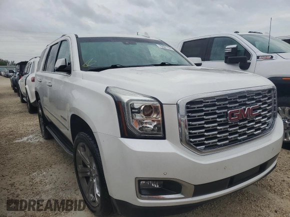 2019 GMC Yukon Denali with VIN 1GKS1CKJ0KR395653, listed as a Copart auction lot 79501764 with 0 mi miles and Salvage Title. Bid and sale history available at carsss.com. Image 4.