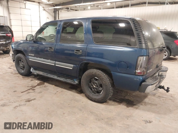 2002 Chevrolet Tahoe LS with VIN 1GNEC13V32R141872, listed as a IAAI auction lot 40994532 with 207,626 mi miles. Bid and sale history available at carsss.com. Image 3.