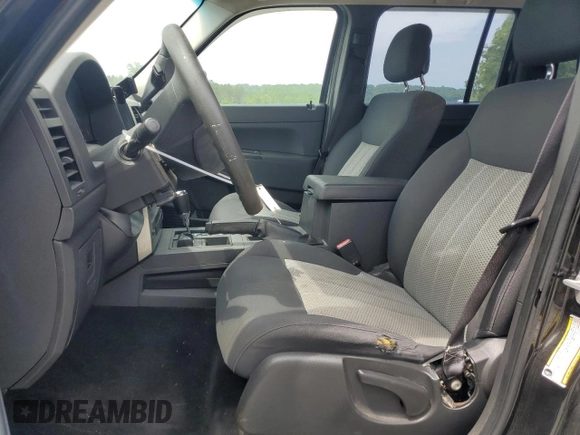 2010 Jeep Liberty Sport with VIN 1J4PN2GK3AW143682, listed as a Copart auction lot 54299555 with 137,257 mi miles and Salvage Title. Bid and sale history available at DreamBid. Image 7.