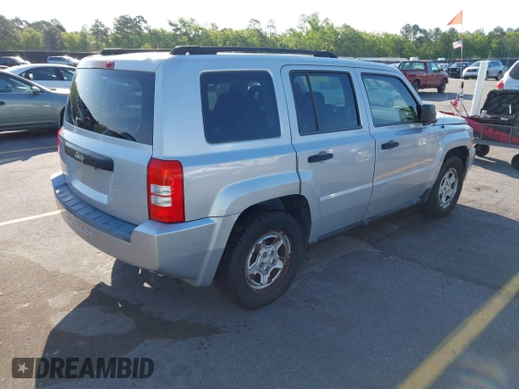2009 Jeep Patriot Sport with VIN 1J4FT28B99D121838, listed as a IAAI auction lot 42000092 with 218,483 mi miles. Bid and sale history available at carsss.com. Image 4.