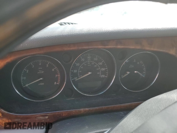 2004 Jaguar XJ 8 with VIN SAJWA71C84SG17802, listed as a Copart auction lot 76880914 with Not Provided miles and Non Repairable. Bid and sale history available at DreamBid. Image 9.