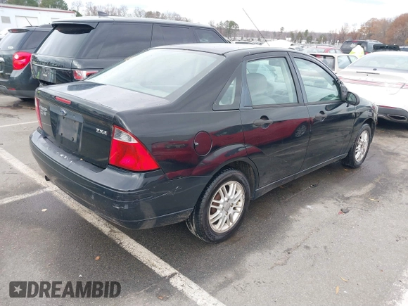 2005 Ford Focus S with VIN 1FAFP34N75W304479, listed as a IAAI auction lot 41117405 with 234,312 mi miles. Bid and sale history available at carsss.com. Image 4.