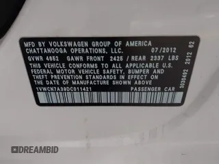 2013 Volkswagen Passat TDI SEL Premium with VIN 1VWCN7A39DC011421, listed as a IAAI auction lot 42042189 with 141,670 mi miles. Bid and sale history available at carsss.com. Image 9.