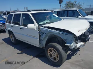 1996 Jeep Grand Cherokee Limited with VIN 1J4GZ78YXTC378363, listed as a IAAI auction lot 42391787 with 129,921 mi miles and . Bid and sale history available at DreamBid. Image 1.