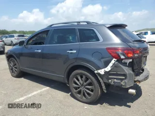 2014 Mazda CX-9 Grand Touring with VIN JM3TB3DV9E0444720, listed as a Copart auction lot 63687855 with 144,568 mi miles and Salvage title. Bid and sale history available at DreamBid. Image 2.