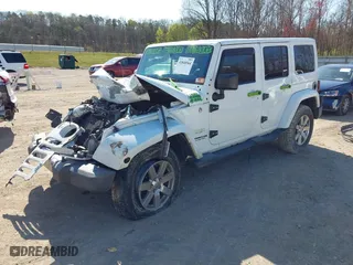 2015 Jeep Wrangler Unlimited Sahara with VIN 1C4BJWEG0FL578900, listed as a IAAI auction lot 41848564 with 96,444 mi miles. Bid and sale history available at carsss.com. Image 17.