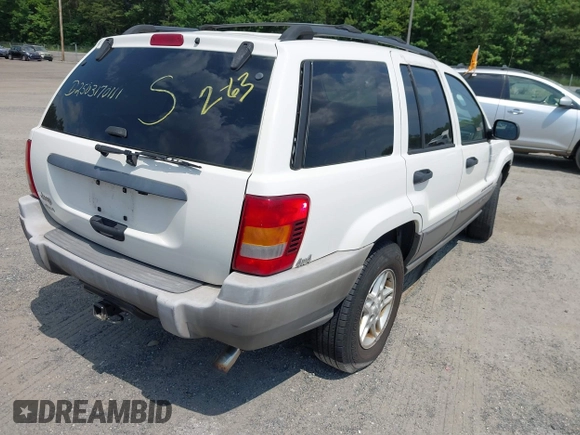 2003 Jeep Grand Cherokee Laredo with VIN 1J4GW48S73C605561, listed as a IAAI auction lot 42424407 with Not provided miles and . Bid and sale history available at DreamBid. Image 4.