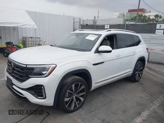 2024 Volkswagen Atlas SEL Premium R-Line with VIN 1V2FR2CA7RC543176, listed as a IAAI auction lot 42358945 with 7,066 mi miles and . Bid and sale history available at DreamBid. Image 2.