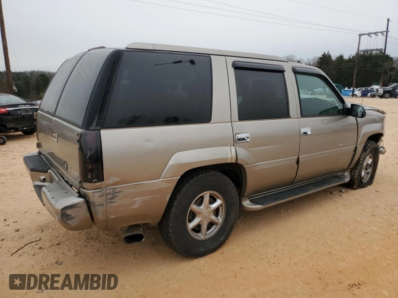 2000 Cadillac Escalade z VIN 1GYEK63R9YR218680, wystawiony jako Copart lot #87393204 z przebiegiem 295 494 mil mil oraz Szkoda całkowita • Salvage title. Historia ofert i sprzedaży dostępna na DreamBid. Obrazek 3.